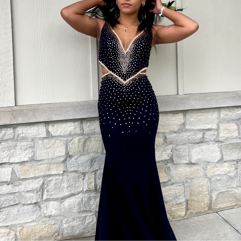 Gorgeous lace up black prom dress with rose gold beading!
